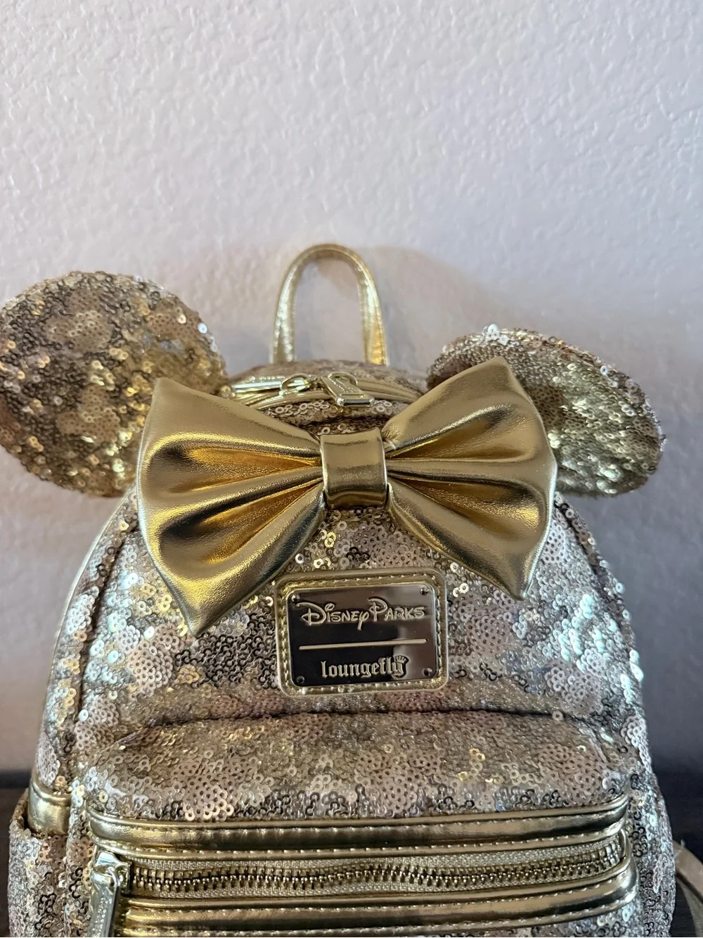Loungefly Disney gold sequin backpack with hidden mickeys